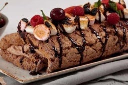 Nestlé BAR-ONE Hot Chocolate Cake Roll with Warm BAR-ONE Sauce and Toasted Marshmallows
