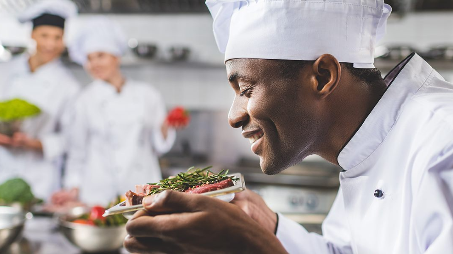 Chef specialist in the Food industry appreciating finer plate presentation